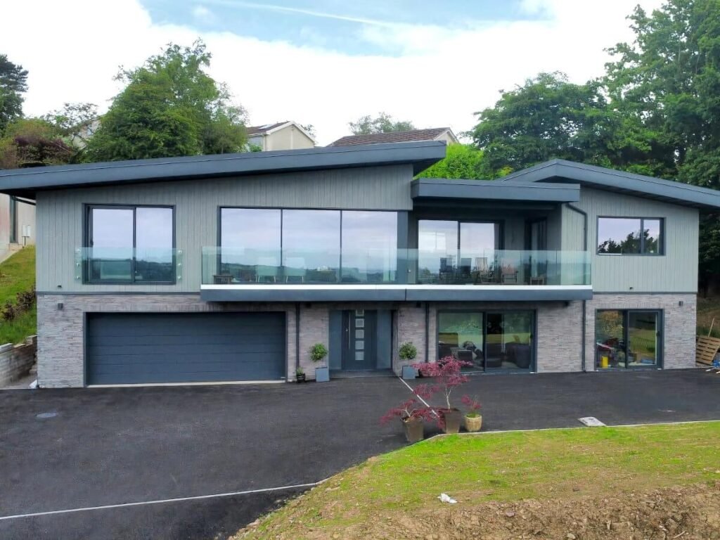 Glass Balustrades on Swansea home exterior by Juliet balcony installers, Swansea Glass Balustrades.