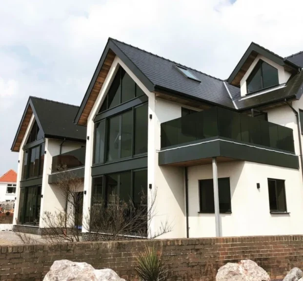 Glass balcony balustrade showing glass juliet balcony grey apex house in Swansea by Swansea Glass Balustrades