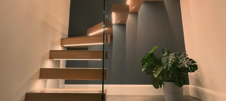 Glass staircase balustrade showing floating staircase wide view in Swansea by Swansea Glass Balustrades