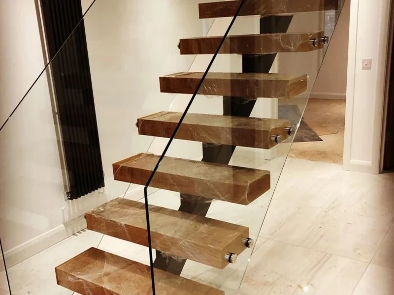 glass-balustrade-staircase-floating-timber-tread-staircase-2-swansea-swansea-glass-balustrades-wide Floating timber-tread staircase with a frameless glass balustrade in Swansea by Swansea Glass Balustrades